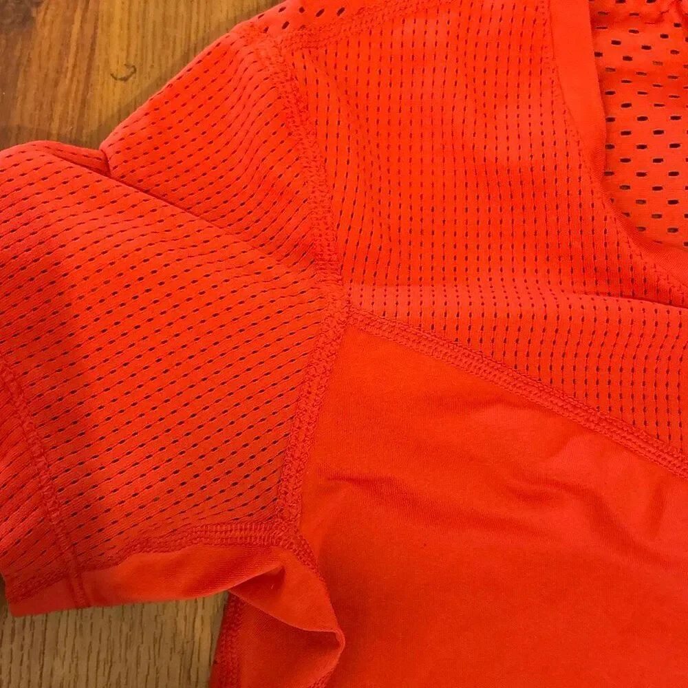 Nike Pro Dri-fit red short sleeve fit top athletic top with mesh inserts and bac